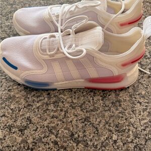 Adidas NMD_V3 sneakers in the "Cloud White/Blue/Red" color